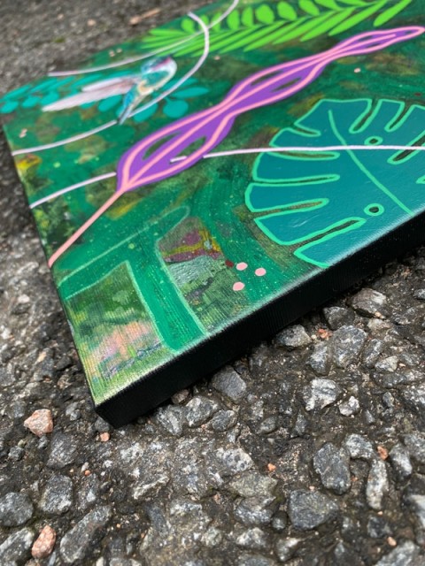 Sorte kanter rundt lerretet.